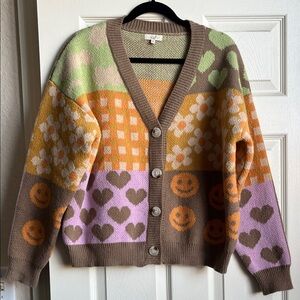 NWOT Oversized Sweater with hearts, smiley faces, clouds in cute colors!